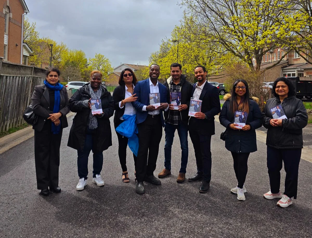 Jay Hayles with the volunteer canvassing team on a Ward 2 residential street